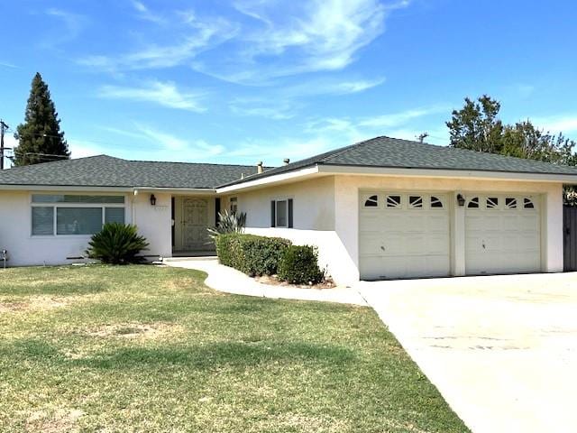 1320 Maple, Selma, CA 93662 - single story home featuring a garage, stucco siding, concrete driveway, and a front lawn