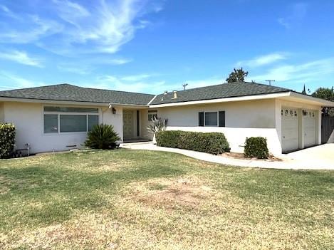 1320 Maple, Selma, CA 93662 - ranch-style house featuring an attached garage, stucco siding, a front lawn, and concrete driveway