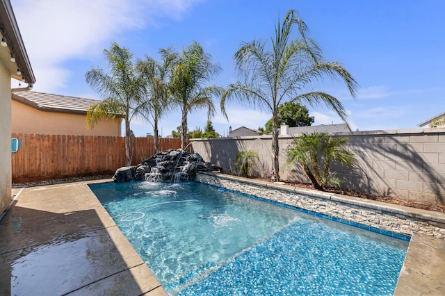 7374 E Flint Way, Fresno, CA 93737 - view of pool featuring a fenced backyard