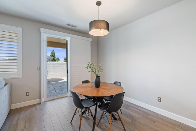 7374 E Flint Way, Fresno, CA 93737 - dining room featuring wood finished floors and baseboards