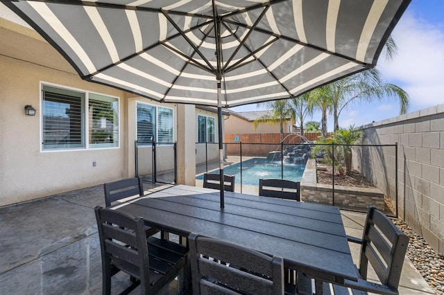 7374 E Flint Way, Fresno, CA 93737 - deck featuring outdoor dining space, a fenced backyard, and a patio