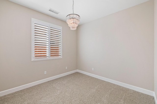 7374 E Flint Way, Fresno, CA 93737 - carpeted spare room featuring a chandelier and baseboards