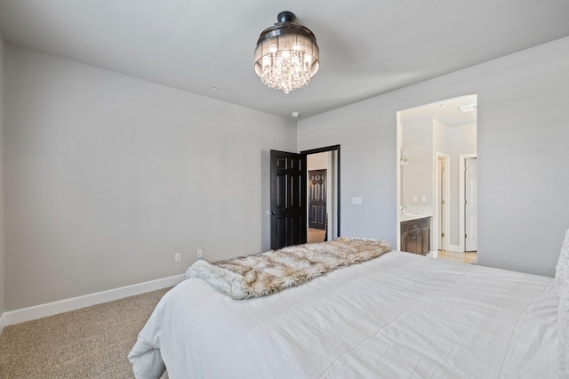 7374 E Flint Way, Fresno, CA 93737 - bedroom featuring a chandelier, baseboards, carpet floors, and ensuite bath