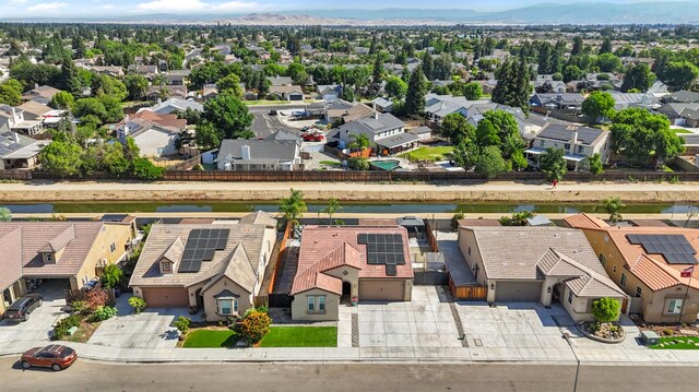 7374 E Flint Way, Fresno, CA 93737 - aerial view of residential area featuring a water and mountain view
