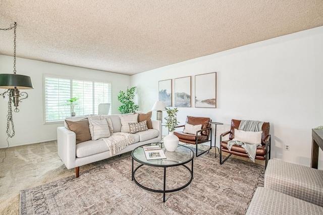 4588 E Pico Ave, Fresno, CA 93726 - carpeted living room with a textured ceiling