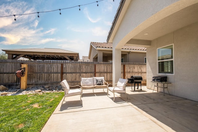 511 Timberline Way S, Madera, CA 93636 - view of patio / terrace with an outdoor living space and a gazebo