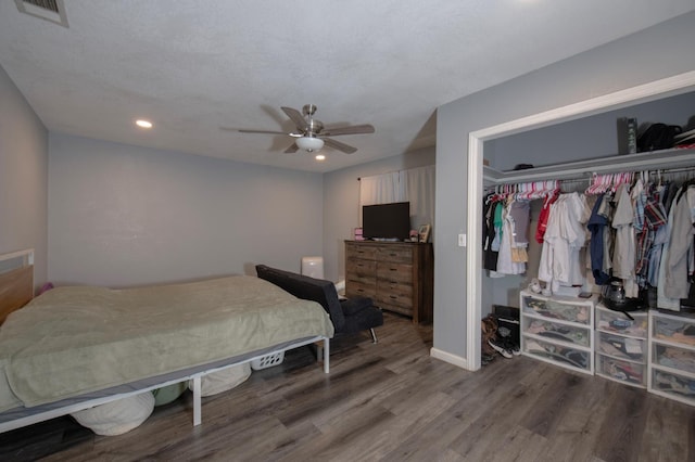 168 E Stuart Ave, Fresno, CA 93710 - bedroom with wood finished floors, a closet, recessed lighting, baseboards, and a ceiling fan