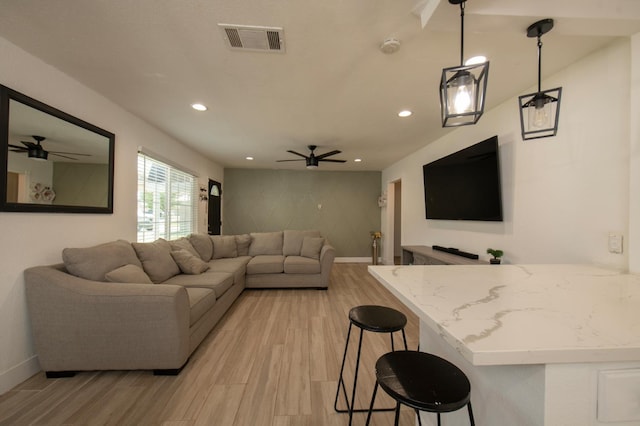 168 E Stuart Ave, Fresno, CA 93710 - living area featuring light wood-style floors, ceiling fan, recessed lighting, and baseboards