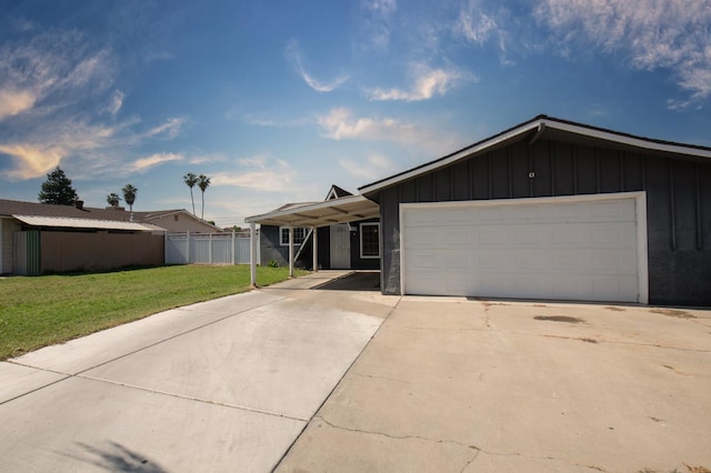 168 E Stuart Ave, Fresno, CA 93710 - ranch-style home with board and batten siding, concrete driveway, and an attached garage