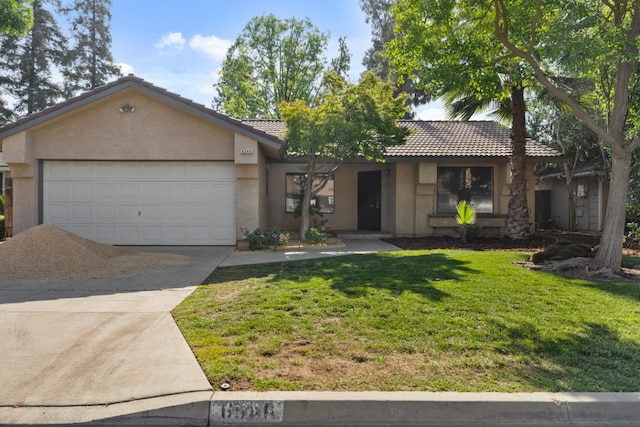 6546 N Bendel Ave, Fresno, CA 93722 - single story home featuring stucco siding, concrete driveway, a tiled roof, a garage, and a front lawn