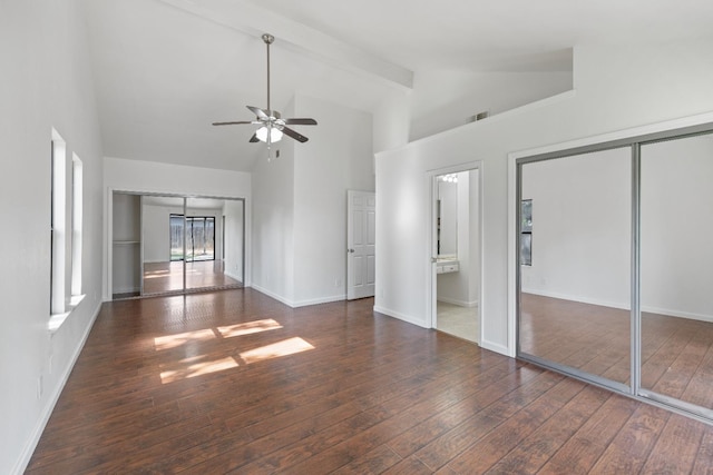 6546 N Bendel Ave, Fresno, CA 93722 - unfurnished living room with ceiling fan, wood-type flooring, high vaulted ceiling, baseboards, and beam ceiling