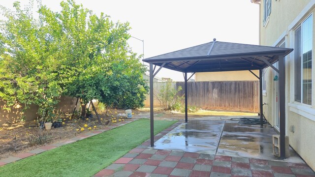 758 Persimmon, Madera, CA 93638 - fenced backyard with a gazebo and a patio