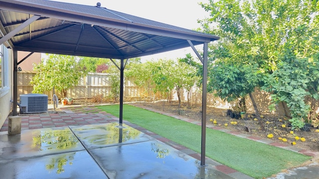 758 Persimmon, Madera, CA 93638 - fenced backyard featuring a gazebo, central AC, and a patio area