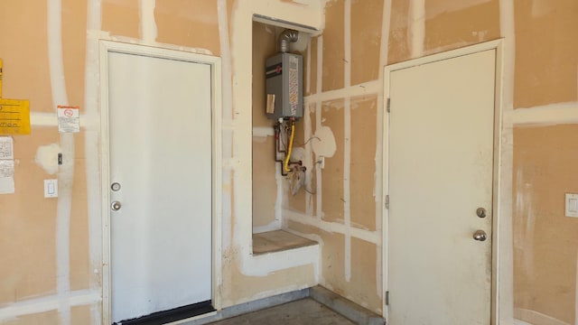 758 Persimmon, Madera, CA 93638 - bathroom with concrete flooring and water heater