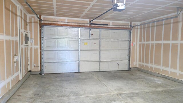 758 Persimmon, Madera, CA 93638 - garage featuring a garage door opener
