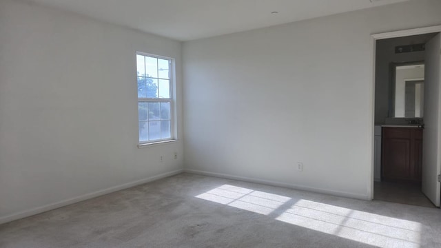758 Persimmon, Madera, CA 93638 - empty room featuring light colored carpet and baseboards