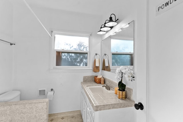 3446 E Lamona Ave, Fresno, CA 93703 - bathroom with vanity and toilet