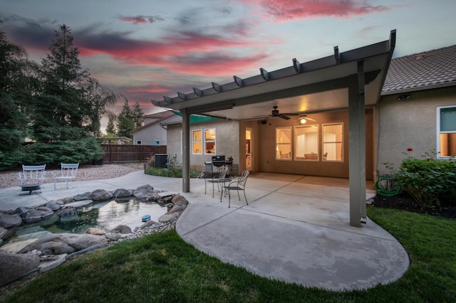3126 San Gabriel Ave, Clovis, CA 93619 - back of property featuring ceiling fan, stucco siding, a patio area, and central AC unit
