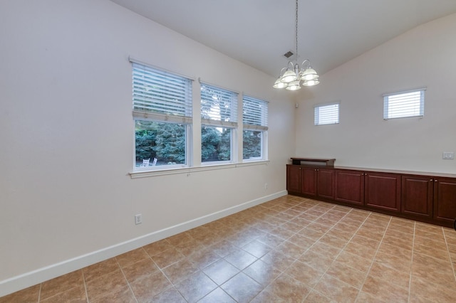 3126 San Gabriel Ave, Clovis, CA 93619 - unfurnished room with a chandelier, vaulted ceiling, and baseboards