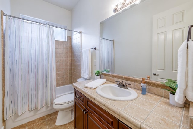 3126 San Gabriel Ave, Clovis, CA 93619 - full bathroom featuring vanity, toilet, shower / bath combo with shower curtain, and tile patterned floors