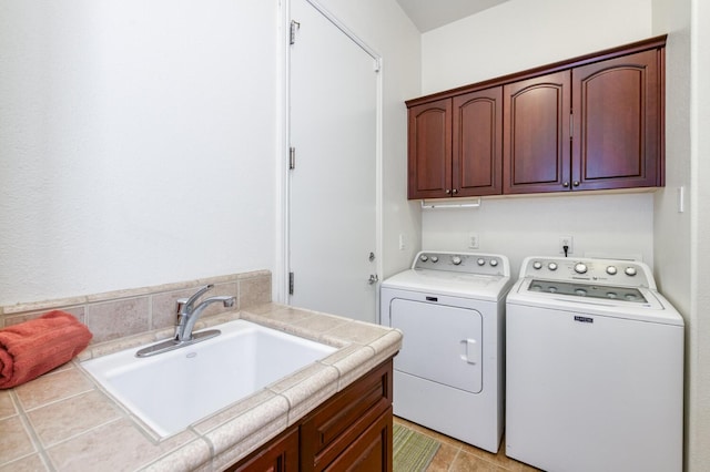 3126 San Gabriel Ave, Clovis, CA 93619 - laundry area featuring cabinet space and independent washer and dryer