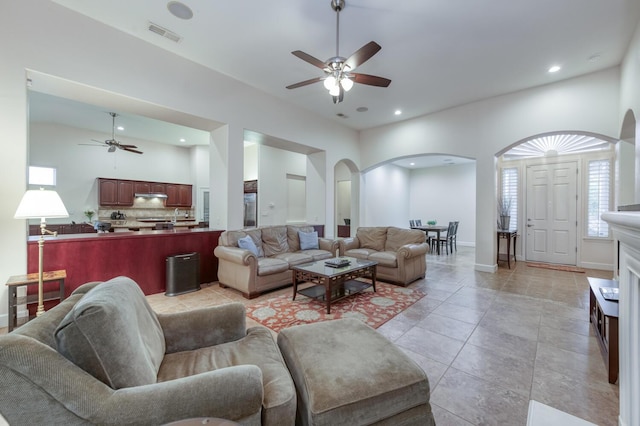 3126 San Gabriel Ave, Clovis, CA 93619 - living area with a ceiling fan, arched walkways, recessed lighting, and baseboards