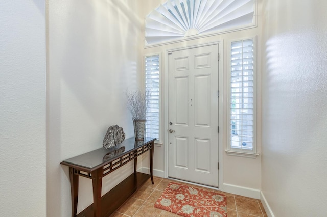 3126 San Gabriel Ave, Clovis, CA 93619 - entrance foyer featuring light tile patterned floors and baseboards