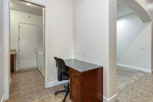 3126 San Gabriel Ave, Clovis, CA 93619 - unfurnished office featuring light tile patterned flooring, baseboards, and arched walkways