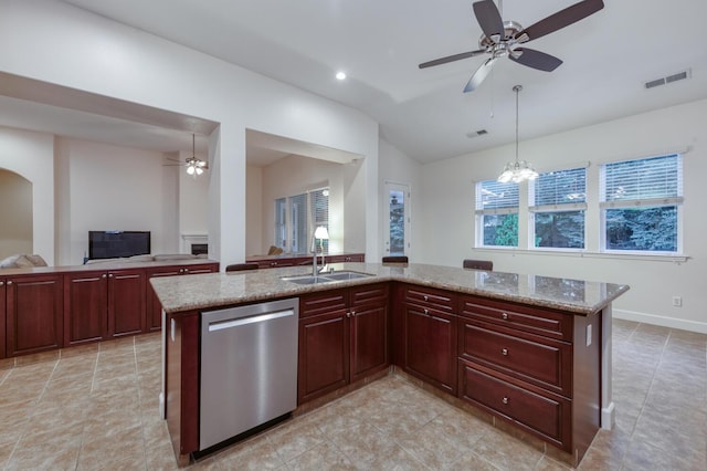 3126 San Gabriel Ave, Clovis, CA 93619 - kitchen featuring stainless steel dishwasher, a sink, reddish brown cabinets, ceiling fan, and open floor plan