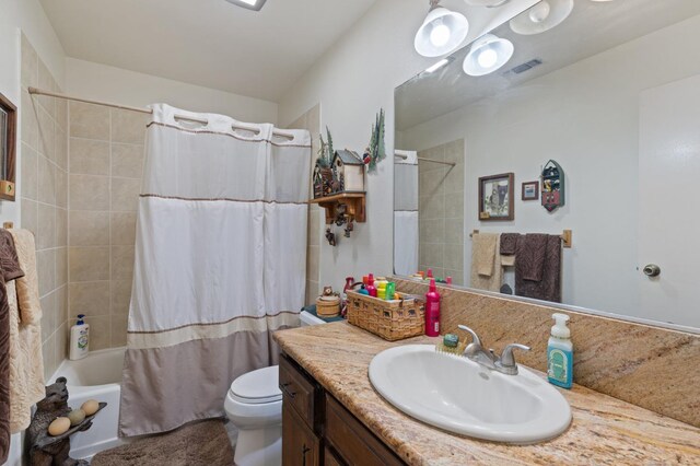 2724 Monocott Dr, Madera, CA 93637 - bathroom featuring vanity, toilet, and shower / bath combination with curtain
