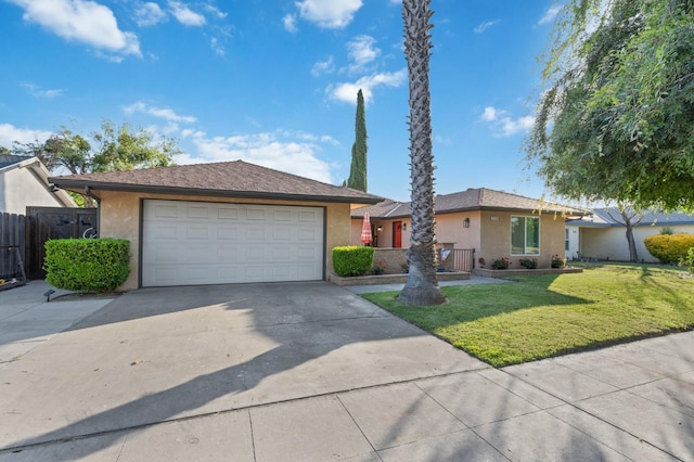 2724 Monocott Dr, Madera, CA 93637 - ranch-style house with stucco siding, driveway, and an attached garage
