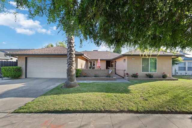 2724 Monocott Dr, Madera, CA 93637 - single story home with stucco siding, concrete driveway, and an attached garage