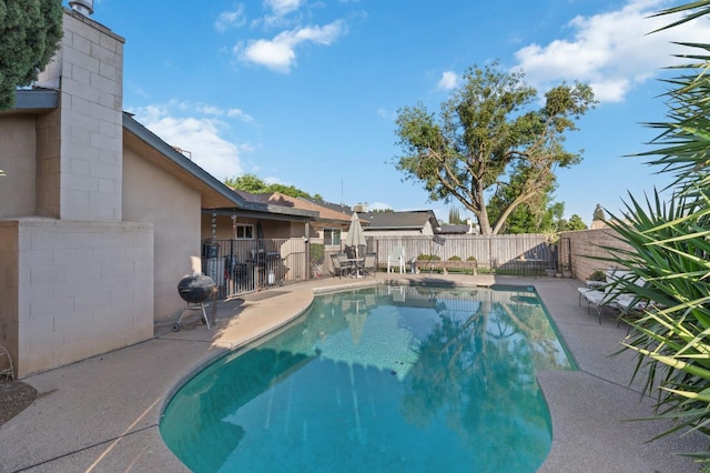 2724 Monocott Dr, Madera, CA 93637 - view of pool featuring a gate, a fenced backyard, and a patio