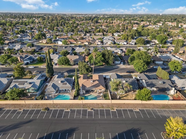 2724 Monocott Dr, Madera, CA 93637 - aerial perspective of suburban area featuring a pool area