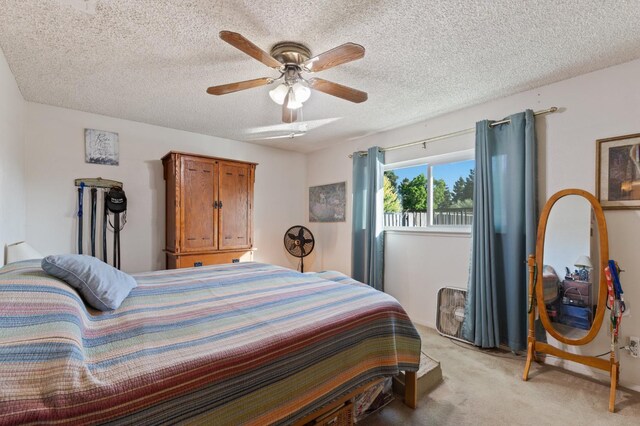 2724 Monocott Dr, Madera, CA 93637 - bedroom featuring light carpet, a textured ceiling, and a ceiling fan