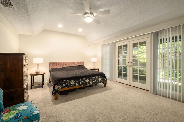 2063 W Barstow Ave, Fresno, CA 93711 - carpeted bedroom with access to outside, french doors, a textured ceiling, multiple windows, and vaulted ceiling