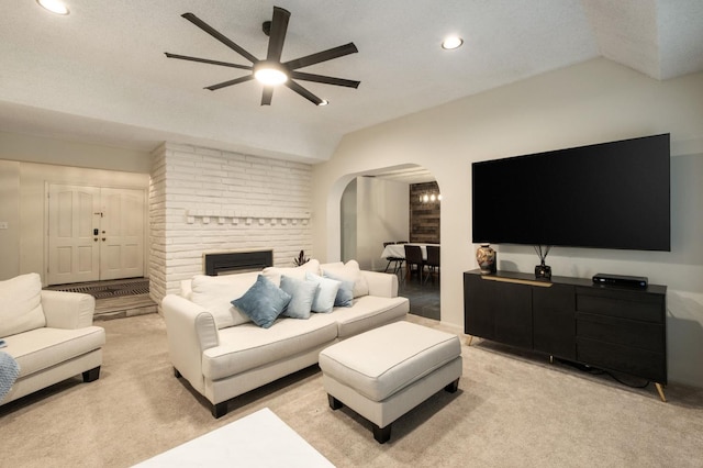 2063 W Barstow Ave, Fresno, CA 93711 - living area featuring arched walkways, a ceiling fan, light carpet, vaulted ceiling, and recessed lighting