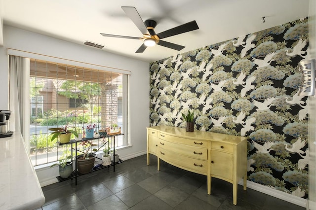 2063 W Barstow Ave, Fresno, CA 93711 - living area with baseboards and ceiling fan