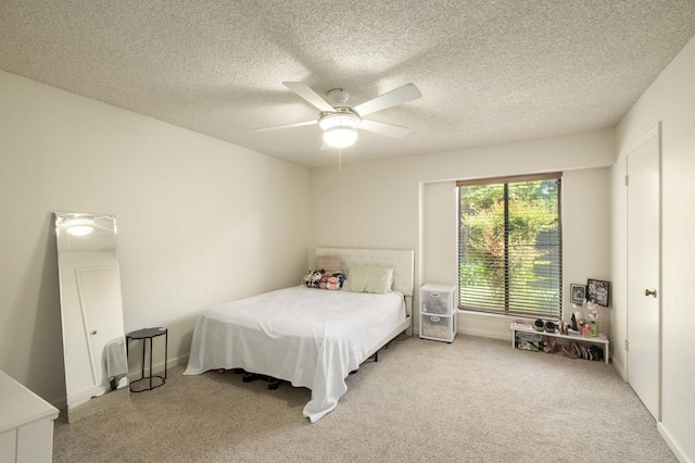 2063 W Barstow Ave, Fresno, CA 93711 - bedroom with carpet, a ceiling fan, a textured ceiling, and baseboards