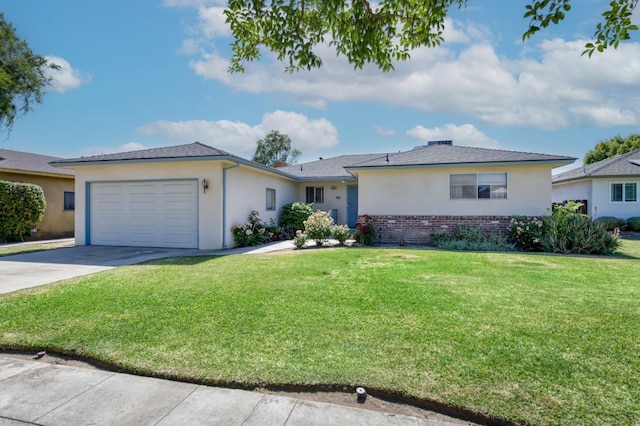 4855 N Gearhart Ave, Fresno, CA 93726 - single story home featuring driveway, a garage, stucco siding, a front lawn, and brick siding