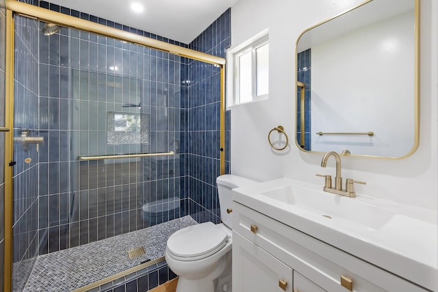 5075 N College Ave, Fresno, CA 93704 - bathroom featuring toilet, a shower stall, and vanity