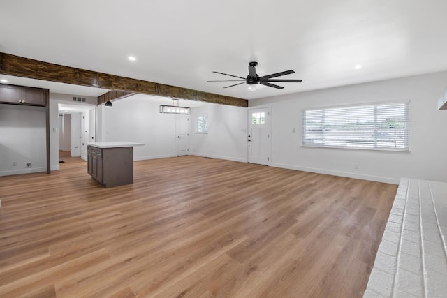 5075 N College Ave, Fresno, CA 93704 - unfurnished living room with ceiling fan, light wood finished floors, baseboards, and recessed lighting