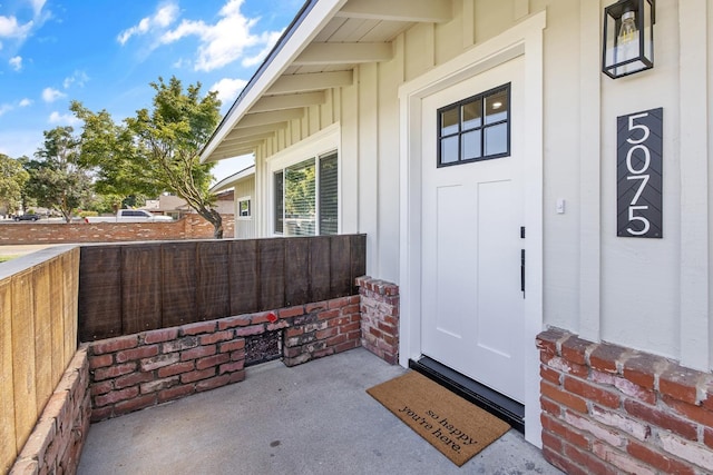 5075 N College Ave, Fresno, CA 93704 - doorway to property with board and batten siding