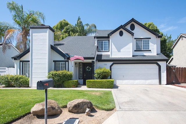 1816 E Frederick Ave, Fresno, CA 93720 - traditional-style home featuring an attached garage, concrete driveway, roof with shingles, and a chimney