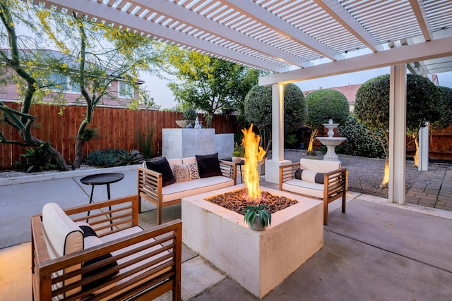 3343 Richmond Ave, Clovis, CA 93619 - fenced backyard featuring a patio area and an outdoor living space with a fire pit