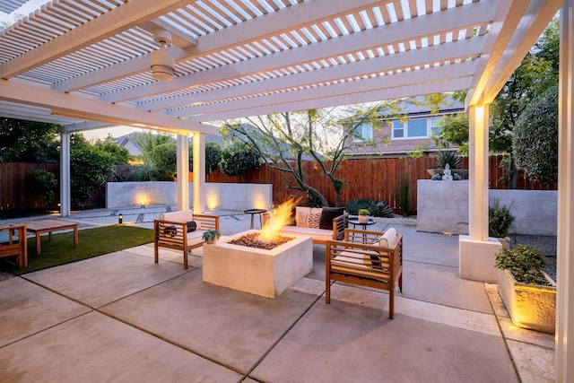 3343 Richmond Ave, Clovis, CA 93619 - fenced backyard featuring a patio area and an outdoor living space with a fire pit