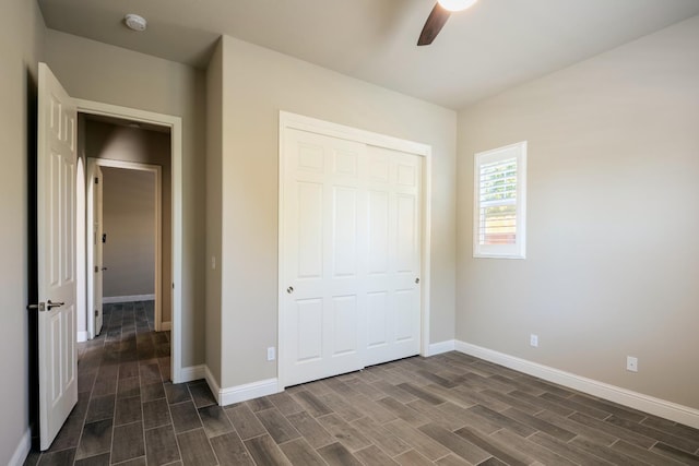 3343 Richmond Ave, Clovis, CA 93619 - unfurnished bedroom featuring wood tiled floors, baseboards, and a closet