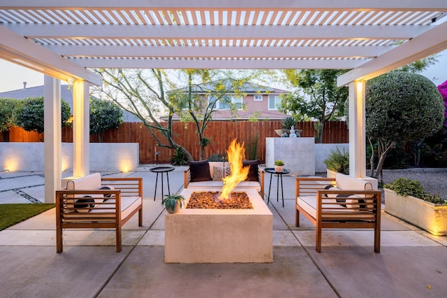 3343 Richmond Ave, Clovis, CA 93619 - fenced backyard featuring a patio and an outdoor living space with a fire pit