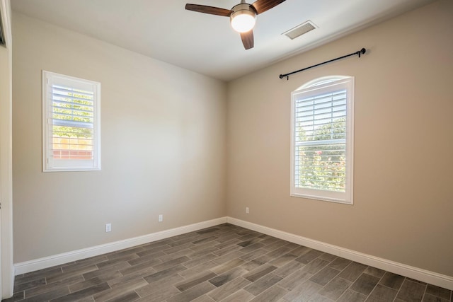 3343 Richmond Ave, Clovis, CA 93619 - unfurnished room with wood finish floors, baseboards, and a ceiling fan