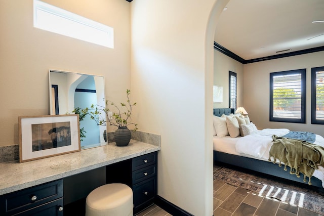 3343 Richmond Ave, Clovis, CA 93619 - bedroom featuring arched walkways, crown molding, and wood finished floors